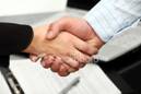 ist2_4783921-handshake-of-business-people.jpg